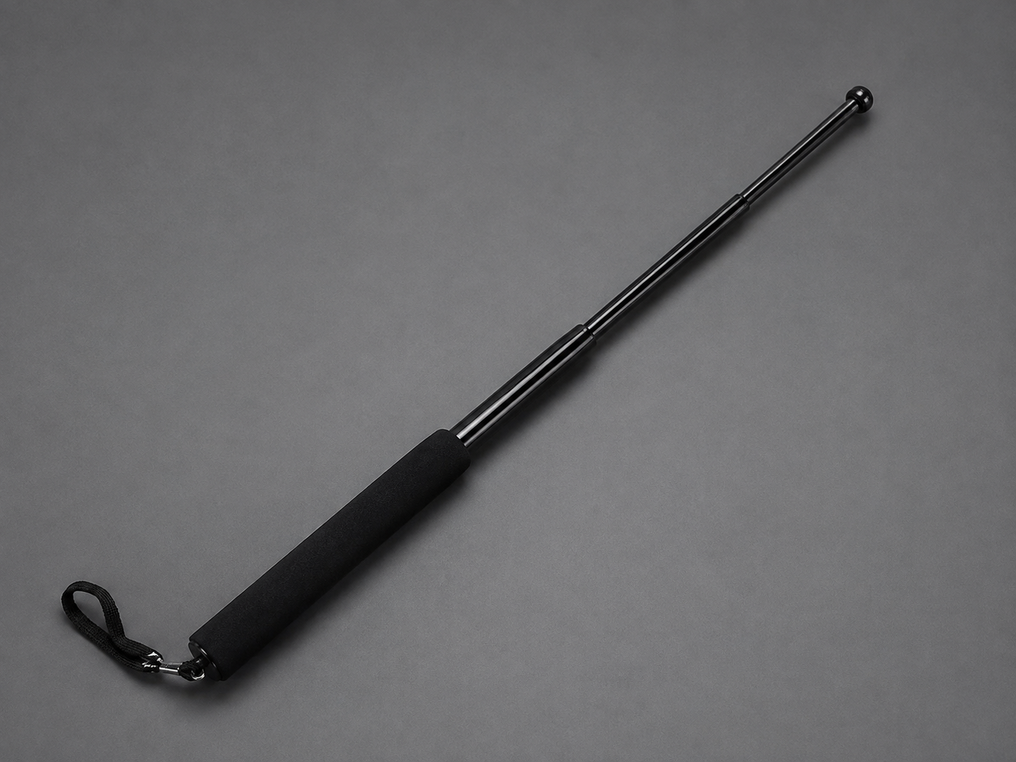 Baston telescopic 64 cm Hozro® din otel inoxidabil cu 4 Elementi cu maner antialunecare si mecanism extensibil design compact si rezistent negru HOZRO