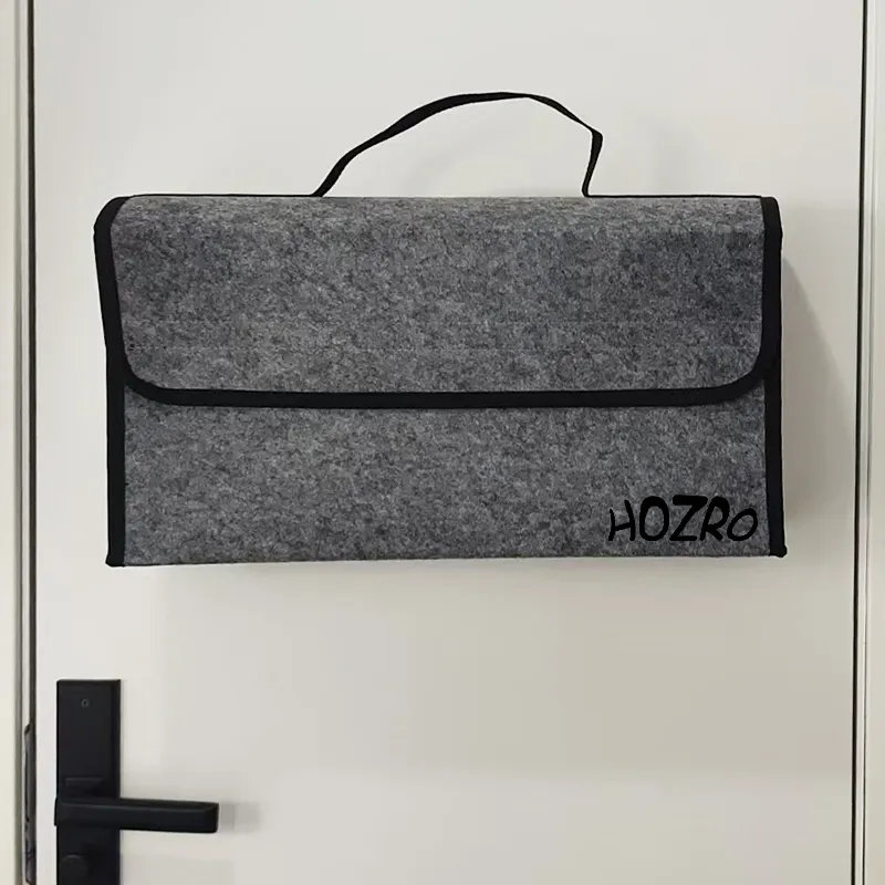 Geantă organizator auto HOZRO, din pâslă, model pliabil, multifuncțională, cu închidere tip clapetă și mâner – ideală pentru portbagaj, depozitare documente, unelte sau accesorii auto, design modern, culoare gri cu margini negre HOZRO