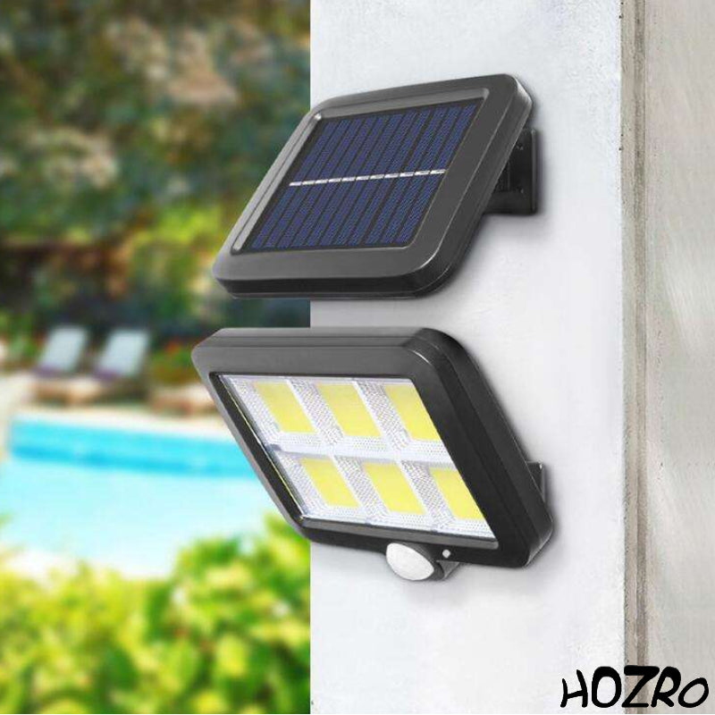 Lampă Solară Exterior HOZRO, cu 120 LED-uri Puternice, Senzor de Mișcare și de Lumină, Panou Solar Ajustabil, Impermeabilă și Eficientă Energetic – Iluminare Automată pentru Curte, Grădină, Alei sau Garaj HOZRO