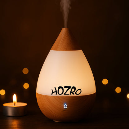 Difuzor de Aromaterapie și Umidificator HOZRO, Model 216, 7 Culori LED Ambientale, Rezervor 235 ml, Încărcare USB, Funcție Timer și Design Elegant în Culoare Bej – Relaxare, Purificare și Atmosferă Plăcută în Orice Spațiu HOZRO