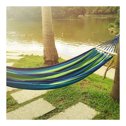 Hamac HOZRO de o persoana, 80 x 200 cm, din bumbac dens, husa depozitare, maxim 150 kg, multicolor, baza lemn, albastru BESTSELLS