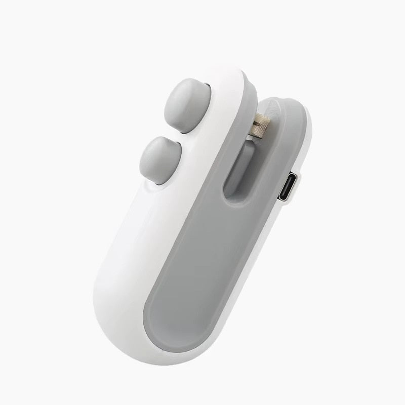 Mini Aparat de Sigilat si Taiat Pungi HOZRO, Portabil, Reincarcabil USB, cu Magnet si Cutit Integrat, Ideal pentru Pungi de Gustari si Alimente, Alb BESTSELLS